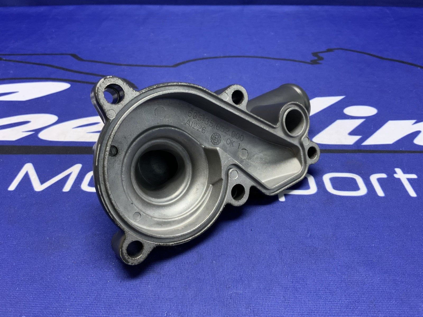 KTM Water Pump Outlet Cover 790 Duke 18-21, 890 Duke/R 20-23 OEM 6353505200041