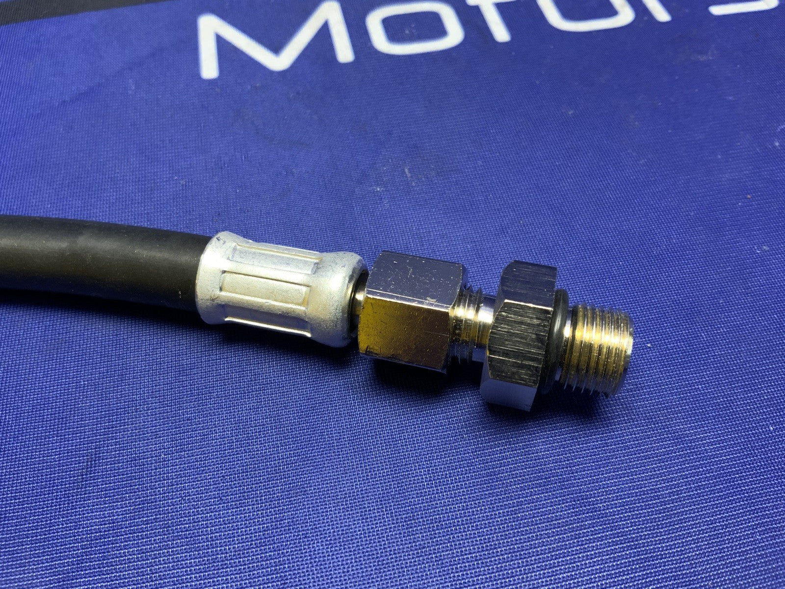 Suzuki Oil Pressure Hose and Adapter OEM 09915-74521