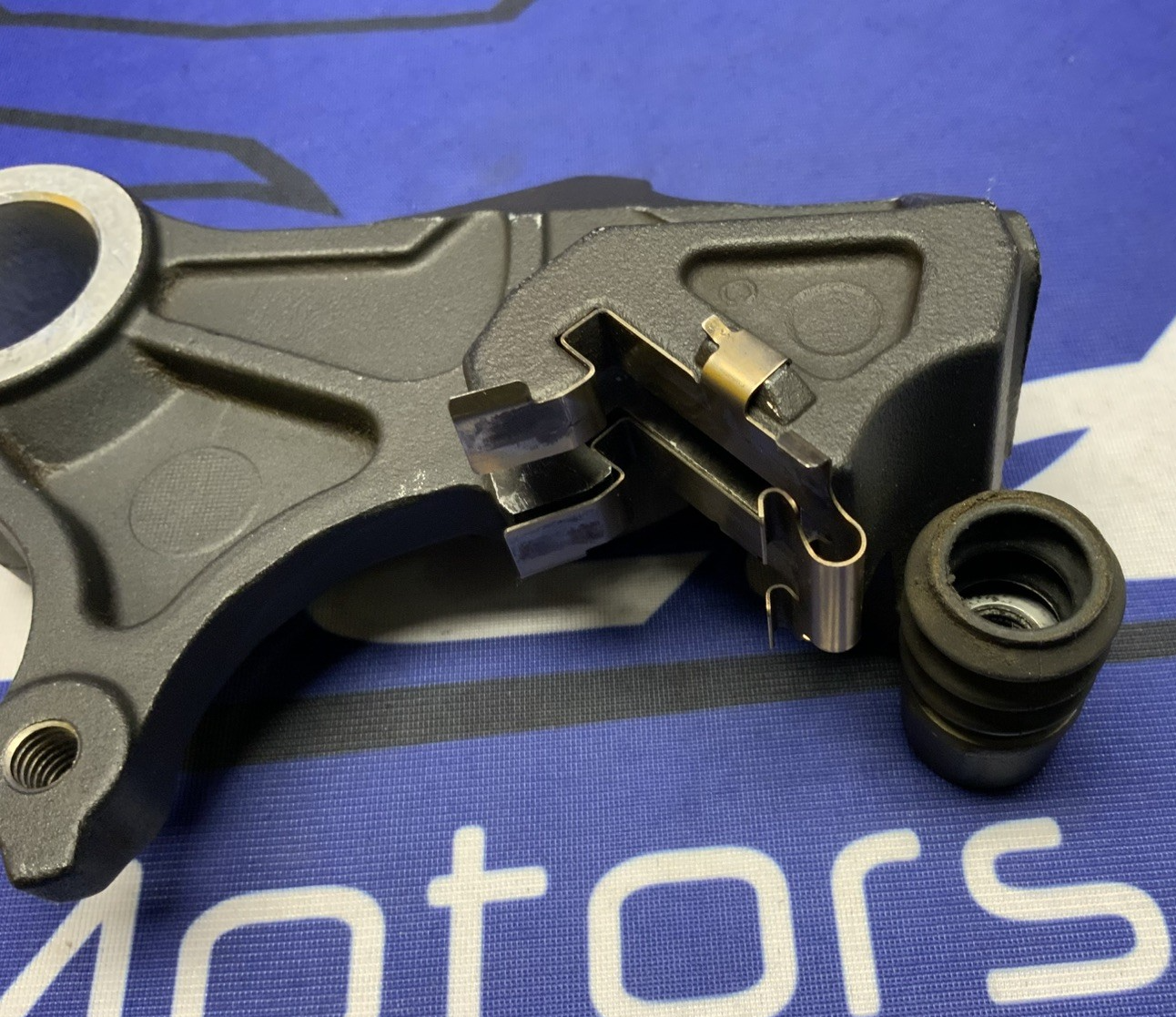 Suzuki Rear Brake Caliper Bracket GSXR 600/750 2006-2007 OEM 69150-01H00