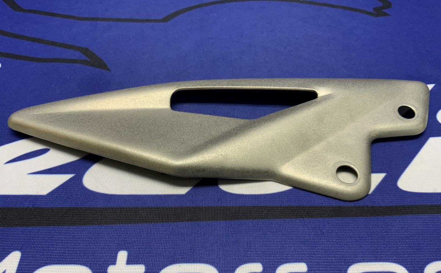 Triumph Right Heel Guard Street Triple RS 2023-2025 OEM T2082773