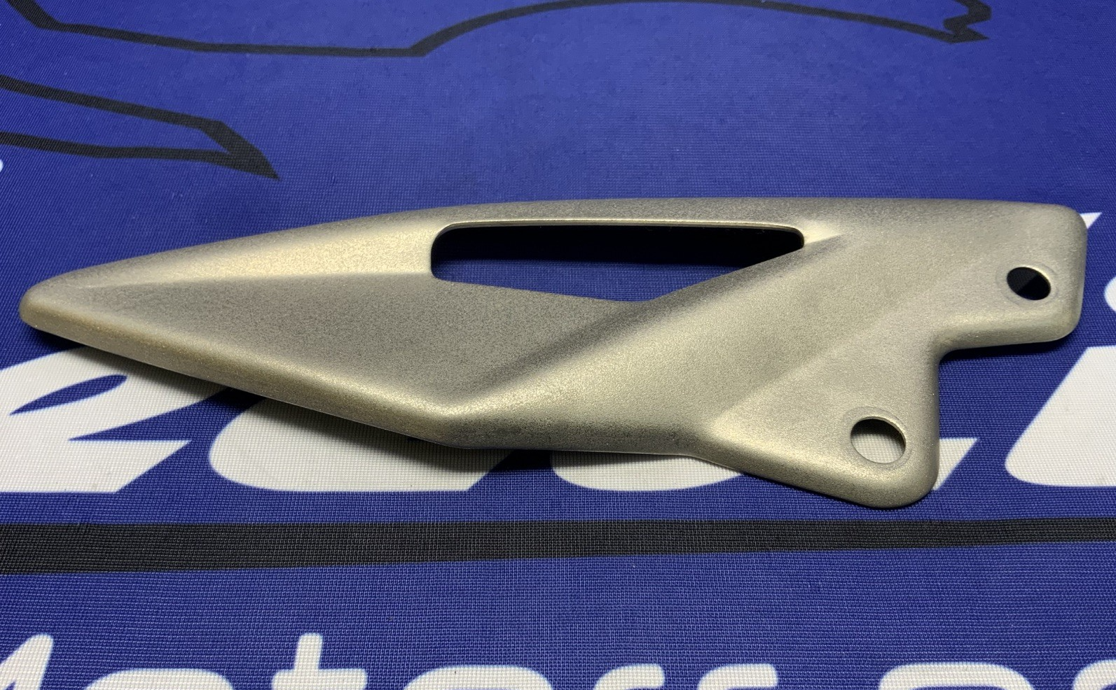 Triumph Right Heel Guard Street Triple RS 2023-2025 OEM T2082773