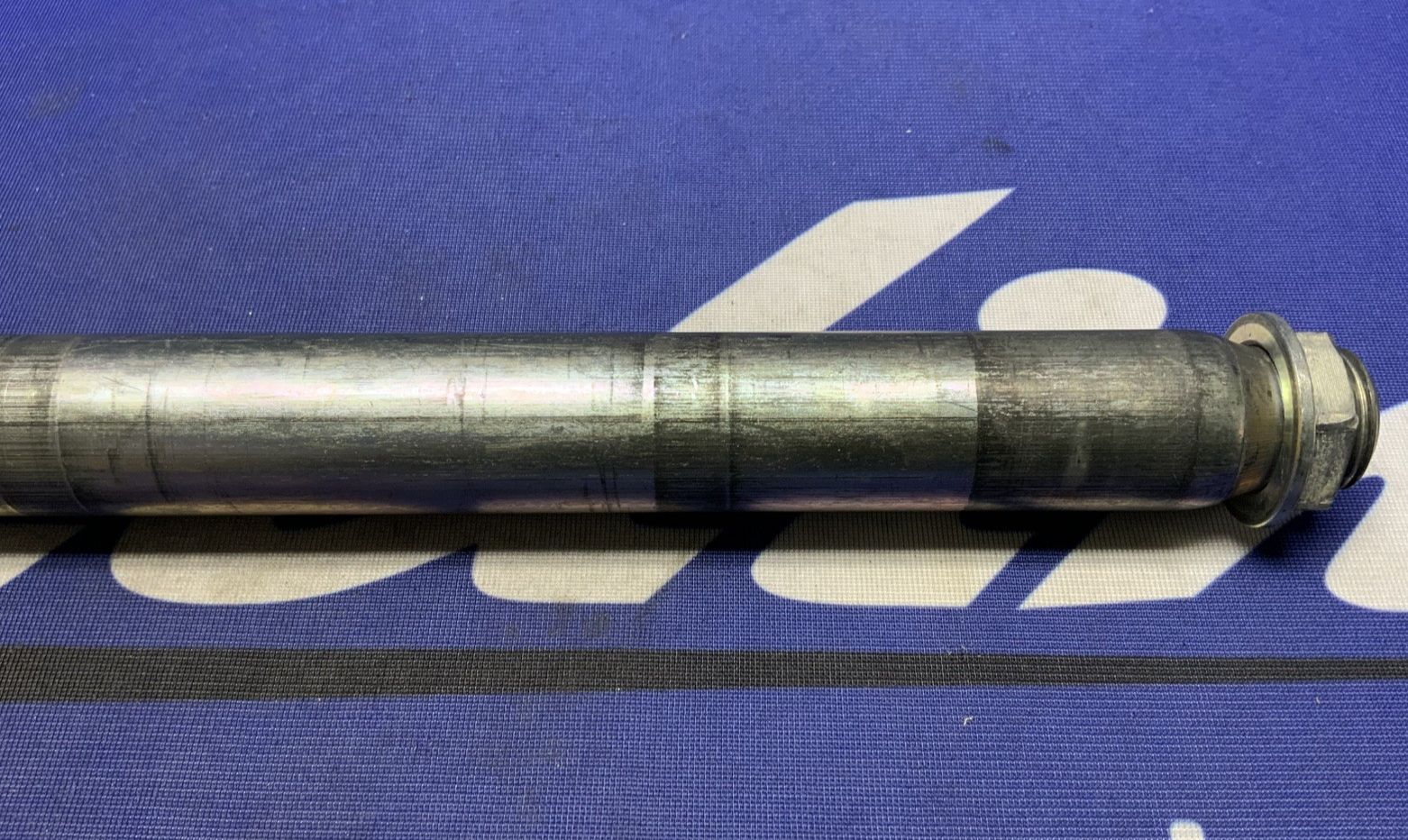 Suzuki Front Wheel Axle W/ Nut RMZ250 2007-2024, RMZ450 2005-2024 OE 54711-35G00