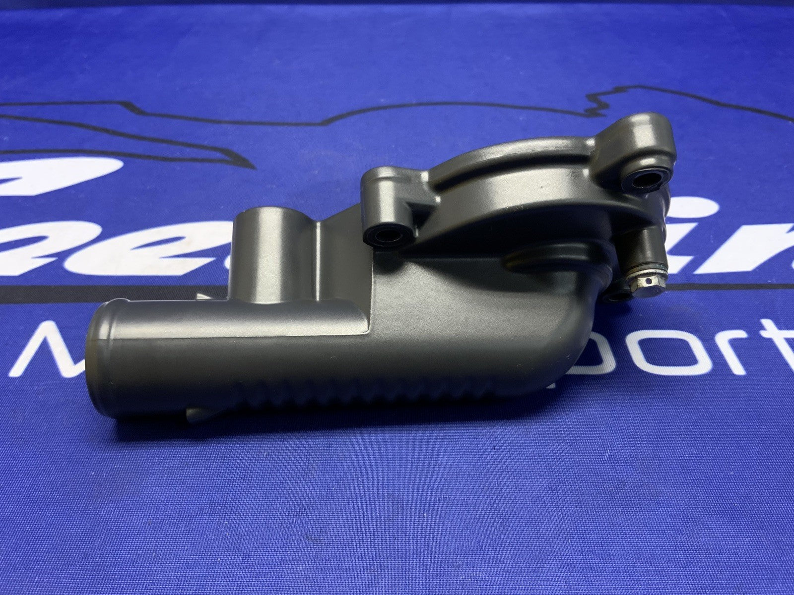 KTM Water Pump Outlet Cover 790 Duke 18-21, 890 Duke/R 20-23 OEM 6353505200041